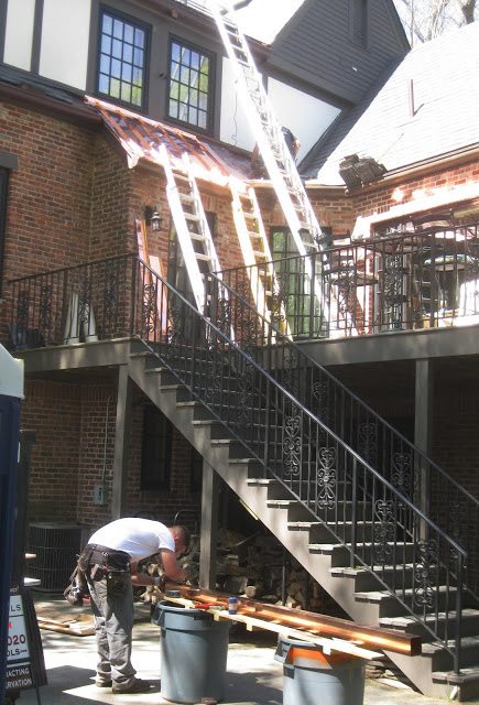 Landmark Roofing repairing copper roof on historic Tudor home in Newton, Massachusetts.