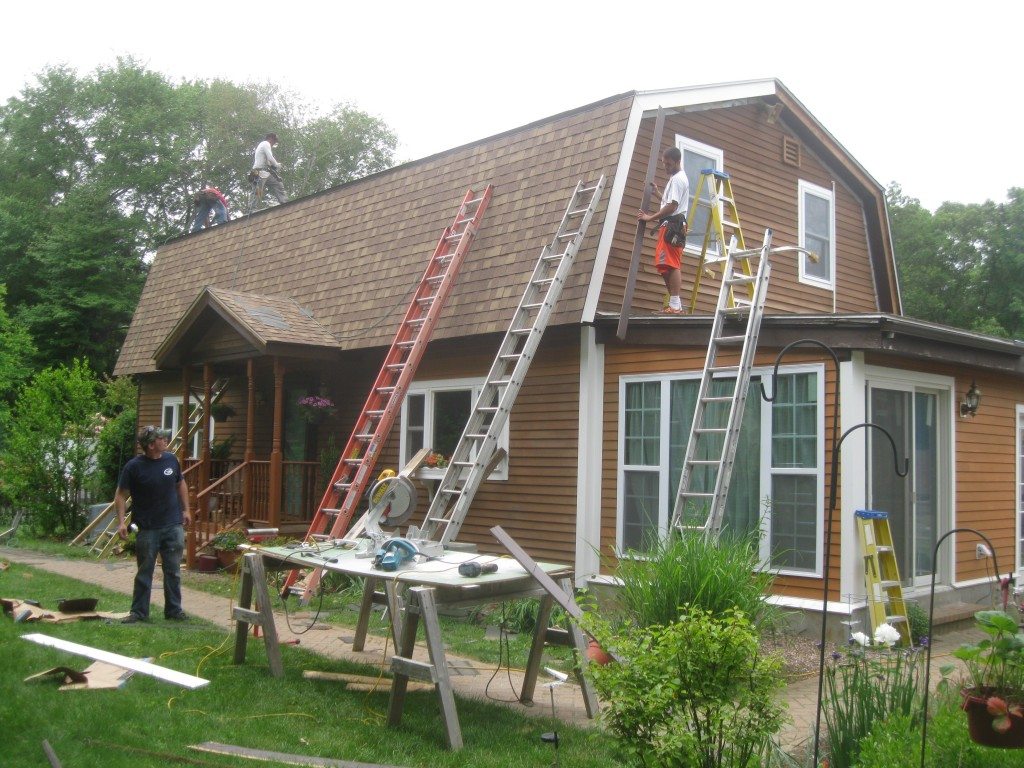 Roof ice rail installation to protect gutters and prevent snow damage.